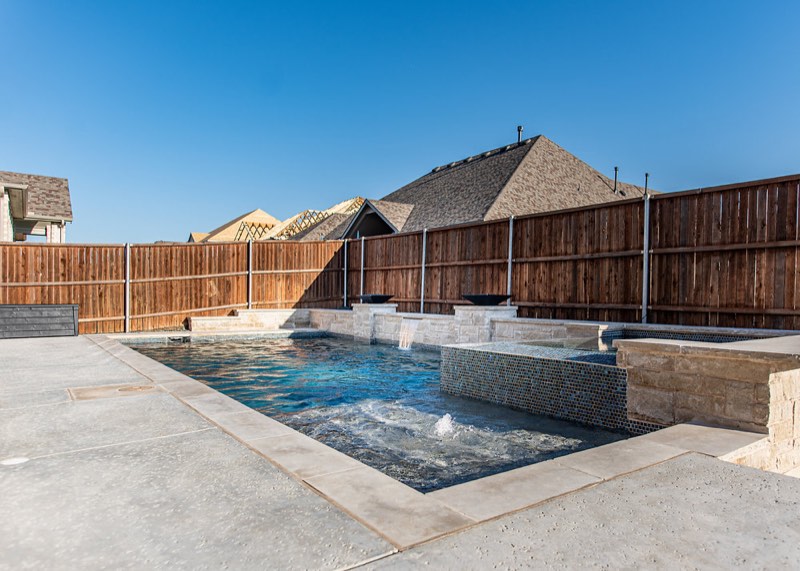 Custom pool built by Hoss Custom Pools - Midlothian Texas